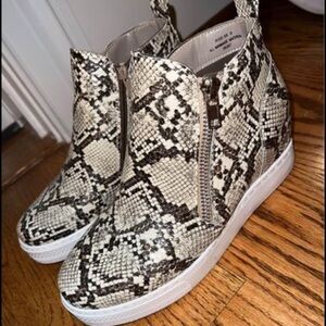 Snakeskin wedge booties